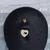 Piercing para ombligo hueco en forma de corazón con poste de aleación de titanio, chapado en oro real, un accesorio de piercing popular para ventas transfronterizas