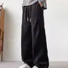 Pantalones casuales holgados versátiles de moda de otoño para hombre, pantalones largos rectos simples, elegantes y relajados de color liso, nuevos