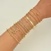 Europa y Estados Unidos popular transfronterizo pie nuevo tobillera femenina cadena de metal multicapa traje de vacaciones en la playa joyería de tobillera