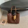 Bolso de Color Sólido Relajado de Gran Capacidad para Mujer 2026 Nuevo Bolso de Hombro Individual Retro de Gamuza y Felpa Bolso de Mano para el Trabajo y el Viaje