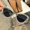 Óculos de sol olho de gato da moda europeia e americana novo estilo personalizado cravejado de diamantes óculos de sol femininos high-end foto de rua óculos de sol decorativos maré