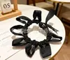 Laços de cabelo estilo girly em estoque para atacado, scrunchies fofos de cor creme estilo coreano, cordas de cabelo, faixas de cabelo