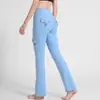 Pantalones de yoga para trabajo transfronterizos con bolsillos, pantalones ajustados de melocotón para mujer, pantalones largos deportivos de running y fitness que levantan los glúteos