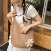 Bolsa de mão trançada para férias casuais transfronteiriças, bolsa tote estilo preguiçoso para o dia a dia, bolsa de ombro transversal vazada para praia e seaside