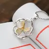 Nafoge joyería de plata al por mayor colgante de plata 925 chapado en oro pétalos molino de viento colgante de plata de ley