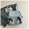 Mochila escolar para clase con letras bordadas, diseño de moño moderno, nueva moda verano 2026, dulce y elegante
