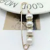 Artefato apertado na cintura muda-cintura Broche oval fixo pino anti-exposição joia pino de peito pérola fivela estilo coreano estilo coreano