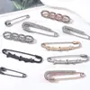 Artefacto de cintura ajustada Pantalones Falda Cintura Cambio grande Alfileres pequeños Ropa de mujer Cárdigan Suéter Hebilla anti-corrimiento Broche fijo