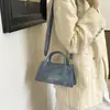 2026 principios de otoño textura vintage simple y elegante bolso cruzado casual bolso cuadrado pequeño de Instagram bolso de mano de moda para el trabajo