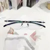 Nuevo modelo de montura de gafas de aleación TR ultraligera con borde cortado, montura de gafas elegante para miopía y presbicia, montura de gafas para hombre E50
