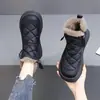 Botas de nieve versátiles de cuero para mujer, nuevo estilo de invierno 2026, forradas de felpa y engrosadas, zapatos de algodón para mujer del noreste, antideslizantes, cálidos, botines