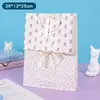 Bolsa de regalo con lazo horizontal para mujer, lindo bolso de mano, bolsa de embalaje para regalo de cumpleaños, bolsa de regalo de papel estilo ins en stock