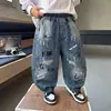Jeans de Mezclilla para Niños Primavera y Otoño Pantalones Casuales Estilo Coreano Guapos para Niños Pequeños 2026 Nuevos Pantalones Versátiles para Niños Comercio Exterior
