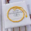 Pulseira Levemente Luxuosa Estilo Vintage Banhada a Ouro com Fragmentos de Ouro, Estrelas, Lua, Flores Pequenas e Corações em Cor Dourada, Design Moderno e Elegante para Mulheres