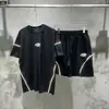 Marca de moda estilo americano SYNA WORLD Traje de manga corta estilo taladro High Street Hip Hop Ins Verano Pantalones cortos casuales para hombres y mujeres