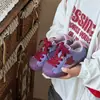 Zapatillas infantiles con puntera de concha 2026 nuevos modelos primavera y otoño zapatos de niña zapatillas de entrenamiento alemanas zapatillas deportivas transpirables para niño estrella