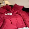 Juego de ropa de cama de cuatro piezas de gasa de doble capa jacquard teñido en hilo de algodón, algodón puro, lujo ligero, tacto de alta gama, sábana plana, funda de edredón, sábana bajera, rojo brillante