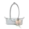 Bolso de axila de nicho estilo coreano para mujer, nuevo bolso de mano de moda transfronterizo, elegante y simple bolso de hombro de lunares para viajar