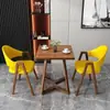 Mesa y sillas de reunión de estilo nórdico, moda italiana, lujo ligero; mesa de recepción y negociación de negocios de alta gama, mesa de ocio para patio