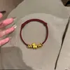 Nuevo Pulsera Dorada de Caballo Estilo Chino con Hilo Rojo para Mujer, Pulsera Tejida de Alta Gama, Accesorio del Zodiaco para el Año del Caballo