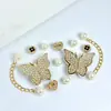 Nuevos Zapatos Croc Hebilla de Zapato Diamante Mariposa Accesorios Estilo Coreano Joyería DIY Accesorios para Zapatos Pantuflas de Verano Hebilla de Zapato