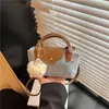 Bolso Pequeño de Moda Color Block para Mujer 2026 Verano Nuevo Estilo Bolso Cuadrado Pequeño Casual Simple Bolso Cruzado de Mezclilla Texturizado