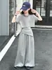 Conjunto de Camiseta de Manga Corta Irregular que Muestra la Cintura Estilo Coreano para Niñas Mayores, Nuevo Conjunto Sencillo y Elegante de Dos Piezas para Verano