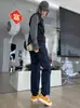 Calças de Caminhada com Novo Logo Triangular 2026 para Homens e Mulheres, Versátil Outono Novo Casual de Perna Reta Ligeiramente Afunilada Três-Provas Calças Atacado