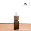 Tampa com padrão de madeira frasco de óleo essencial frasco vazio 5-100ml marrom escuro preto vidro conta-gotas de cabeça plástica frasco sub-frasco de líquido bruto