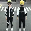 Ropa para Niños Conjunto Deportivo Elegante de Tres Piezas para Niños Mayores Primavera y Otoño 2026 Nuevo