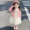 Conjunto de dos piezas de punto para niña de otoño y falda de tul de comercio exterior 2026 nuevo estilo conjunto inspirado en Chanel ropa para niños envío directo