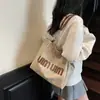 Bolsa Grande Mujer Gran Capacidad 2025 Nuevo Otoño Estudiante Universitario Clase Bolso de Hombro Personalizado Ropa de Trabajo Bolso Tote Grande