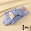 Joelheiras de camada dupla calças quentes infantis espessadas uniforme escolar de aluno do ensino fundamental essencial outono e inverno meninos e meninas camada base de uso interno classe A calças