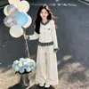 Pantalones casuales de pierna ancha estilo coreano para primavera y otoño 2026 para niños mayores, conjunto de cárdigan a cuadros de colores contrastantes para niñas retro