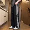 Pantalones de rayas de moda para hombre, primavera y otoño, nuevo estilo versátil, holgados, casuales, de pierna recta, con caída, estilo americano, de pierna ancha, pantalones deportivos