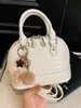 Bolsas de mano de nicho de moda transfronterizas para mujer 2026 nuevo bolso cruzado de moda de verano y bolso de mano de concha