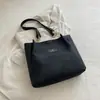 2026 Simple Gran Capacidad Color Sólido Nueva Moda Textura Diaria Casual Viaje Cruzado Hombro Bolso Tote para Mujeres