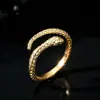 Libro rojo pequeño con el anillo de serpiente espíritu diseño de nicho femenino personalidad de moda marea zodiaco serpiente anillo abierto una generación de pelo