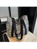 2026 Nueva Bolsa de Lona con Estampado de Leopardo para Mujer Bolso de Hombro de Gran Capacidad Bolsa de Compras para Estudiantes y Viajeros Fábrica