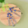 Pendientes Largos con Borla de Plata S925 Rey Ciervo Dorado Paisaje Nacional Elegante Loto Azul Tailandés Pendientes para Mujer Estilo Nuevo