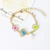Pulsera de Resina con Flores Secas de Flor de Cerezo Chapada en Cobre Color Oro Real Joyería Conservadora de Color Mariposa Perla Pulsera Exquisita Planta