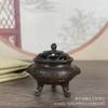 Utensílios de cobre antigos Estilo Xuande fogão simulação produto antigo orelha de elefante três pernas mini incensário Daming Xuan fogão múltiplos Atacado