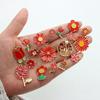 Accesorios de bricolaje Serie Roja Material de aleación Flor clásica Ins Pendientes Pulsera Llavero Colgante