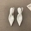 Elegantes zapatos de tacón alto de nicho estilo francés para mujer, nuevo modelo primavera-verano 2025, para usar en exteriores, tacón fino, mules sin cordones inspirados en Chanel