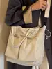 Bolso Tote Sencillo de Color Sólido para Viajes Diarios Mujer Otoño 2026 Nuevo Elegante Textura Individual Bolso Exquisito de Hombro Cruzado
