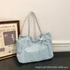 Bolsa tote versátil e despojada transfronteiriça feminina verão 2026 nova estilosa para o trabalho bolsa de ombro simples