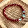 Pulsera de Cinabrio para Mujer Bajo Contenido Arena Dorada Púrpura Colgante de Flor de Loto Joyería Regalo de Cumpleaños para Mujer Venta al por Mayor para Mejor Amiga