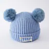 Gorro de doble pompón para niños, otoño e invierno, para niños y niñas, gorro de punto, cálido y a prueba de viento, súper lindo, con forro de felpa