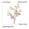 Versão coreana do broche de ramo de borboleta criativa liga strass pino personalidade Coringa vestuário pino acessórios fabricantes atacado