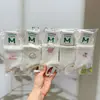 Meias Novas de Outono e Inverno Mian Kao para Mulheres Meia-Calça Meio da Panturrilha Meias de Desenho Animado para Mulheres Estilo Japonês Estilo College Estilo Coreano Meias de Algodão para Estudantes